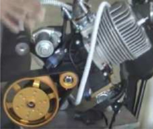 Walkerjet motor installation for paragliding with belt reduction