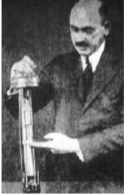 Professor Goddard with one of his rocket engines