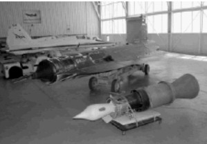 An F-104, the D-21 and its engine in the foreground