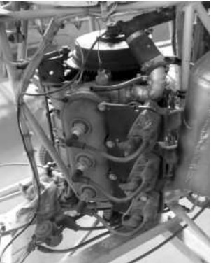 Three cylinder vertical mercury engine on the other side
