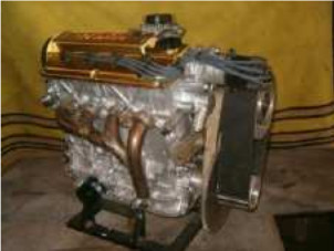 Suzuki 1.6 litre engine with a belt reduction gear